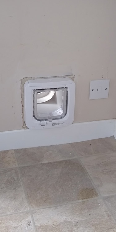 Cat flaps fitted through the wall Kenton and Newcastle