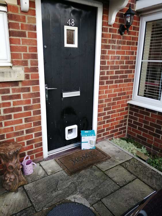 Cat flap installations through a brick wall