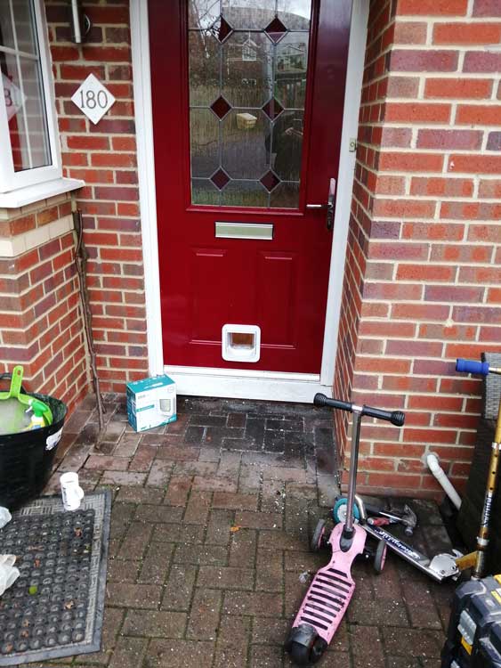 Cat flap installations through a wall