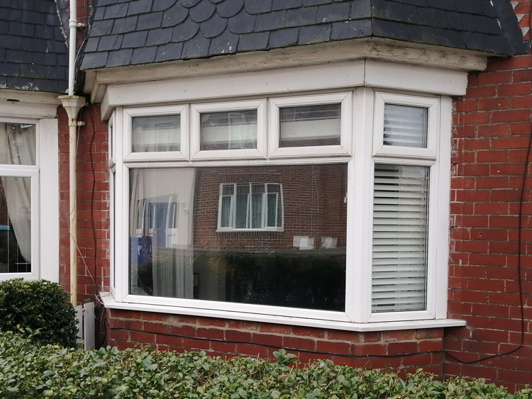 Window glass removed for settee delivery Newcastle