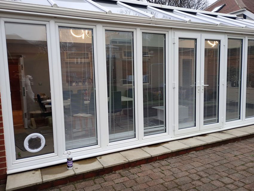 Cat flaps installed in glass