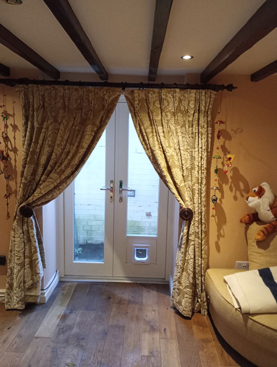 Cat flaps installed in glass