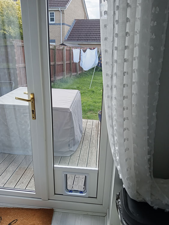 Cat flaps installed in glass doors near me
