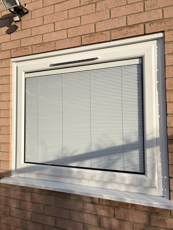 New window with integral blinds installed