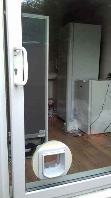 cat flap fitters Brunton Park Gosforth