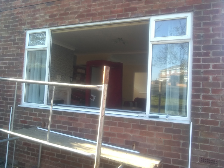 Glazier to remove glass for furniture delivery Newcastle