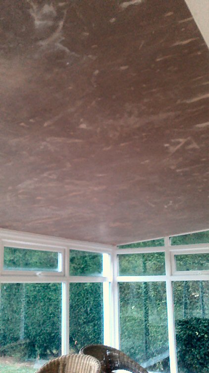 conservatory roof insulation system being plastered