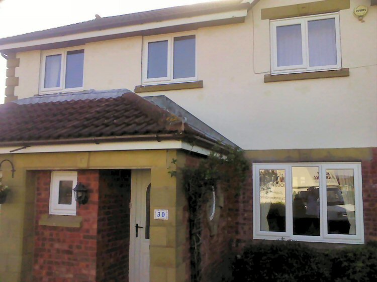 Kommerling window fitters Newcastle using Planitherm glass